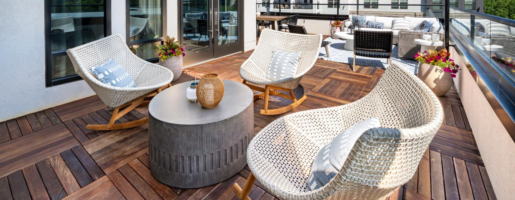 chairs and table on rooftop terrace
