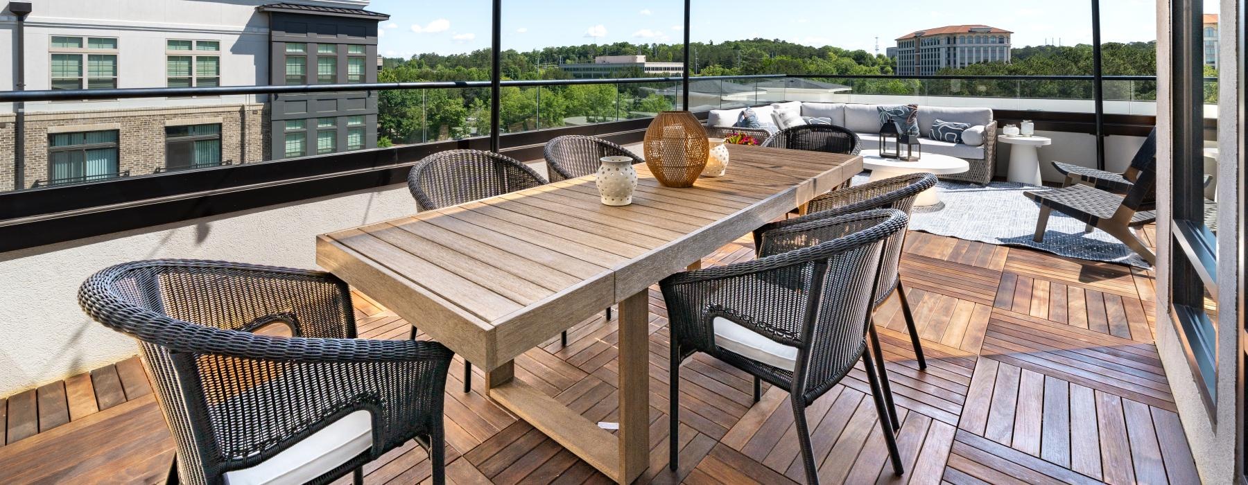 a table and chairs on a deck