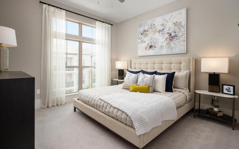a bedroom with a large bed